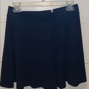 Black mid-thigh skirt